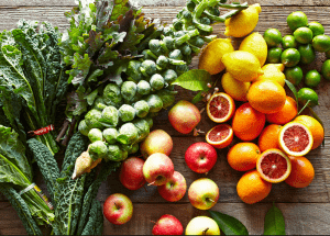 a group of fruits and vegetables on a wood surface Healthy Weight Loss Diets Sandwich